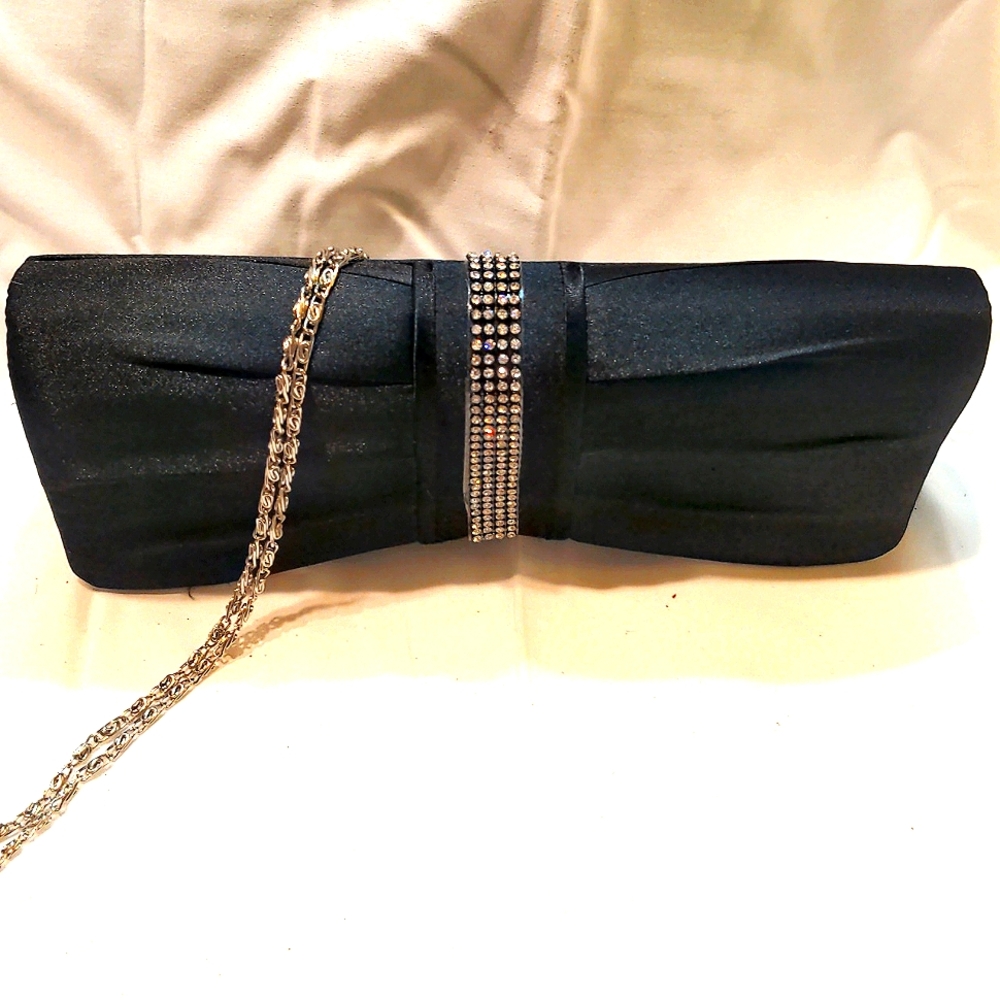 Black satin clutch with rhinestone accent
